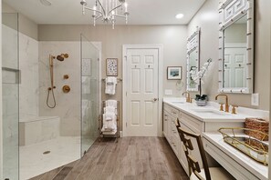 Bathtub, hair dryer, towels, soap