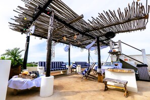 Outdoor dining - The Jardin Suite lower-level suite, poolside w/kitchen at Boutique Hotel (Isla Mujeres)