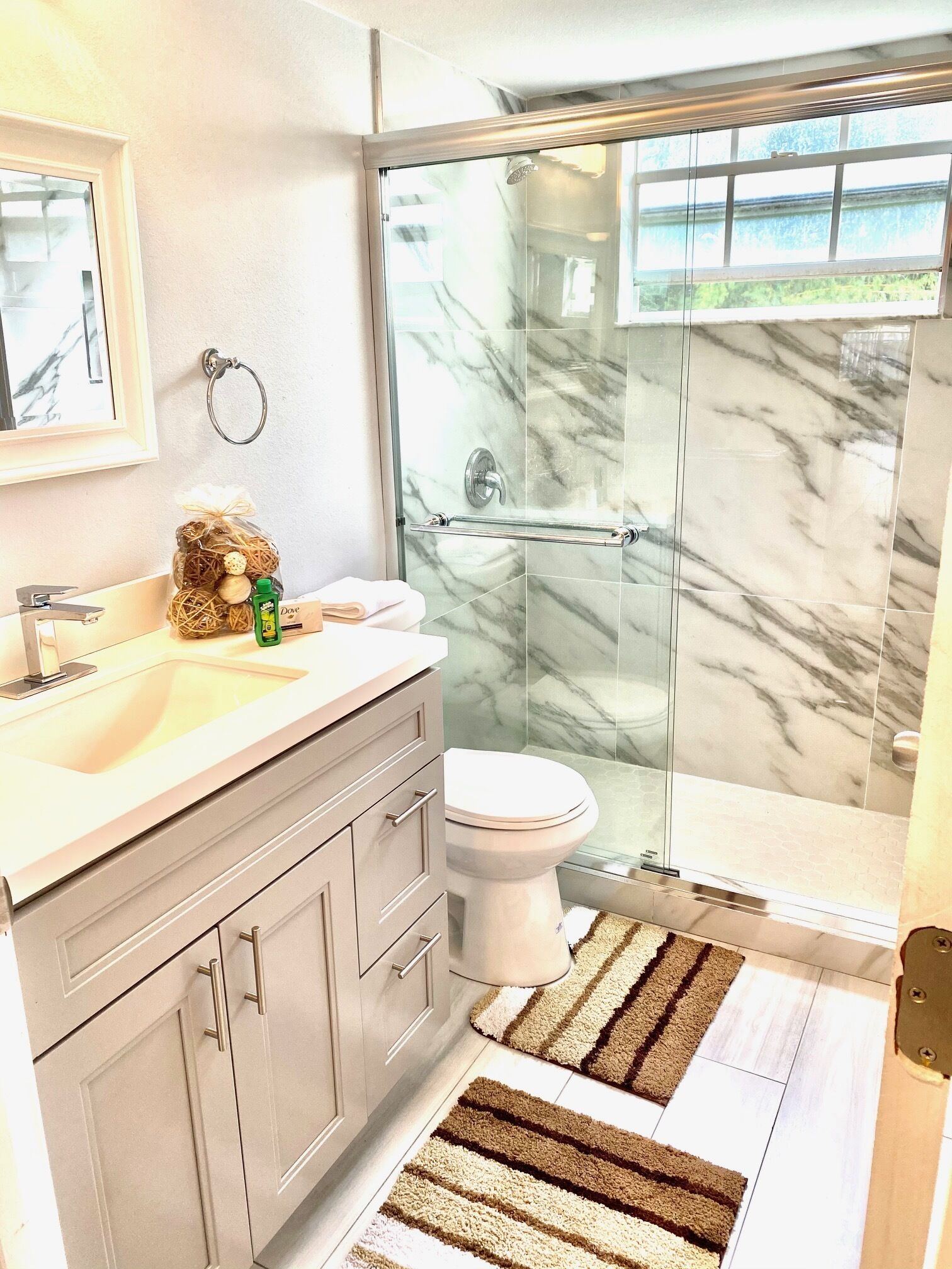 Shower, towels, soap, toilet paper