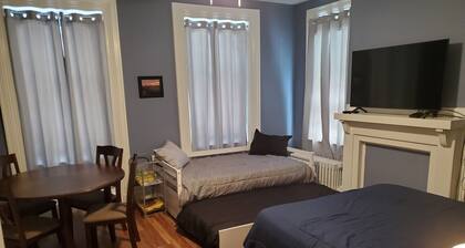 Downtown location w/ parking. Transit stop across the street. Unit 2 of 4.