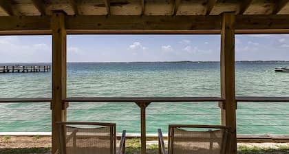 Cozy coastal condo with water view, pool, central A/C, & easy beach access