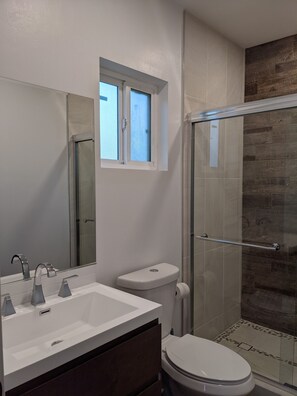 Shower, towels, soap, toilet paper - Brand New Studio, Confortable, and gated parking, close to downtown. (Ensenada)