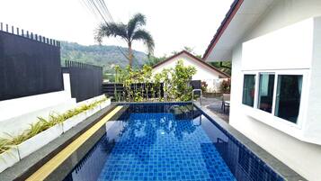 Outdoor pool, sun loungers