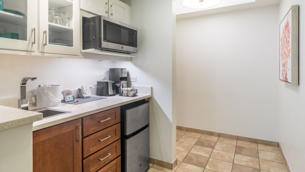 Fridge, microwave, coffee/tea maker, toaster