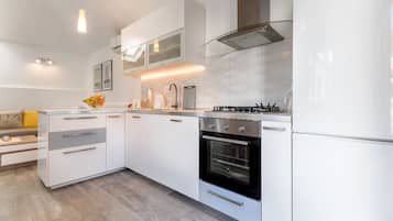 House (Three Bedroom Home with heated Pool a) | Private kitchen | Fridge