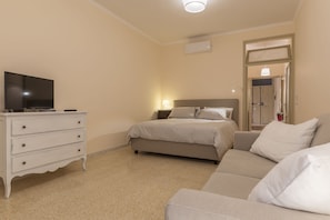Appartement, 1 chambre | 1 chambre, fer et planche à repasser, accès au Wi-Fi (inclus)