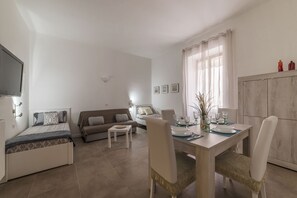 Appartement, 1 chambre | Coin séjour