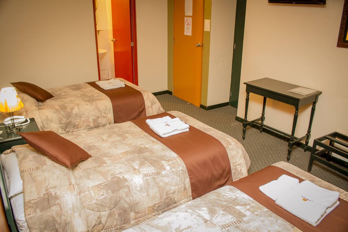 Comfort Triple Room, City View | In-room safe, desk, iron/ironing board (on request), WiFi (free)