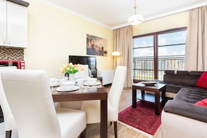 Apartamento, 1 quarto, cozinha | Área de estar