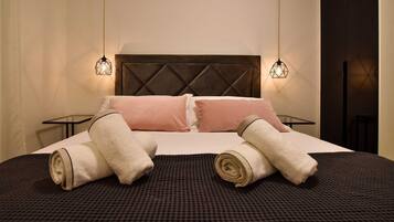 1 soveværelse, pengeskab på værelset, strygejern/strygebræt