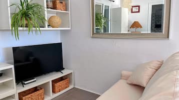 Een smart-tv, een muziekbibliotheek en een stereo