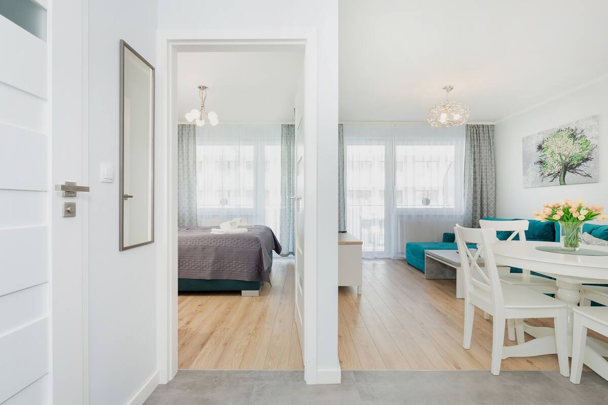 Apartment, 1 Bedroom, Balcony, Beachside | Living area | 40-inch TV with cable channels