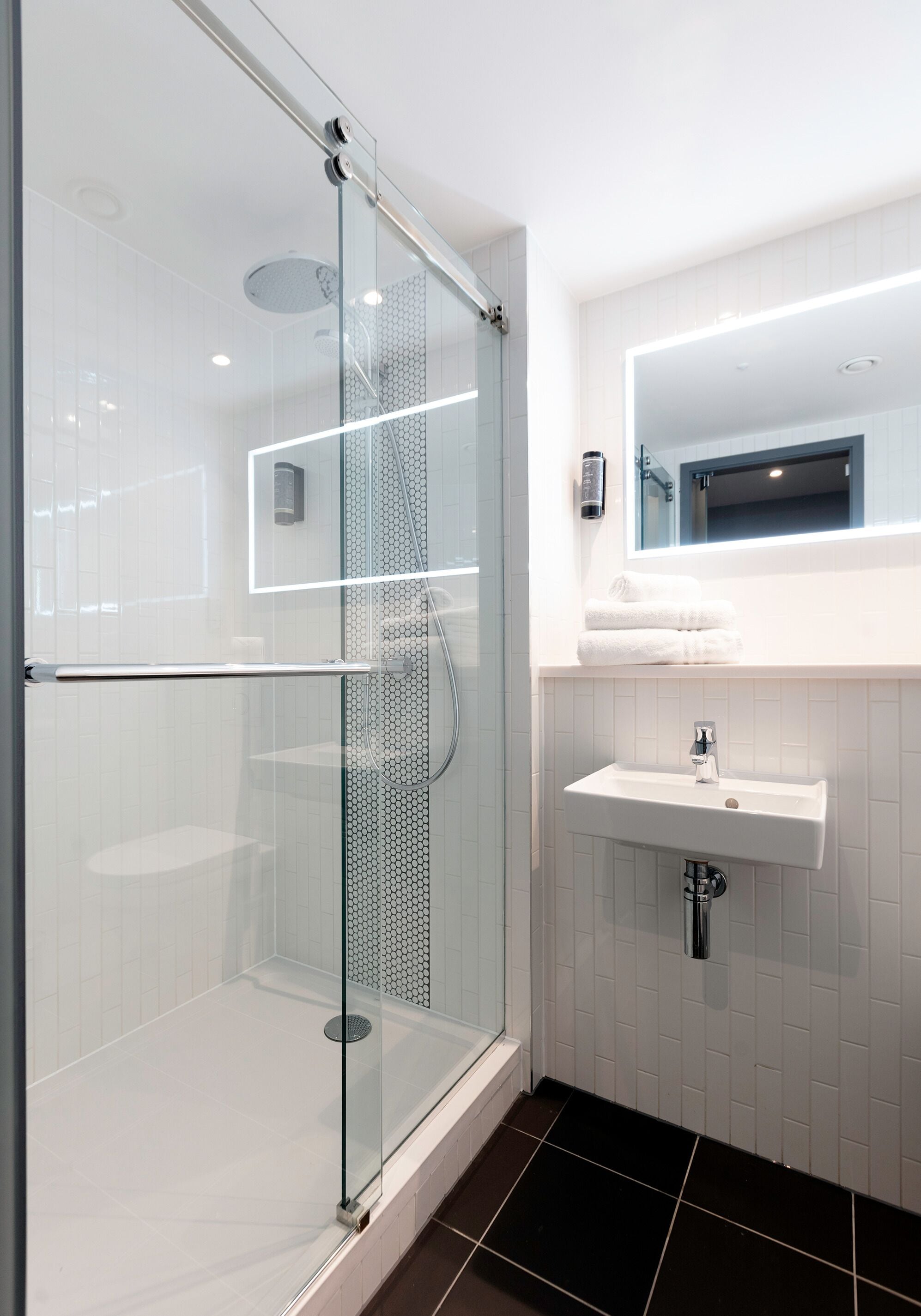 shower, free toiletries, hair dryer, towels