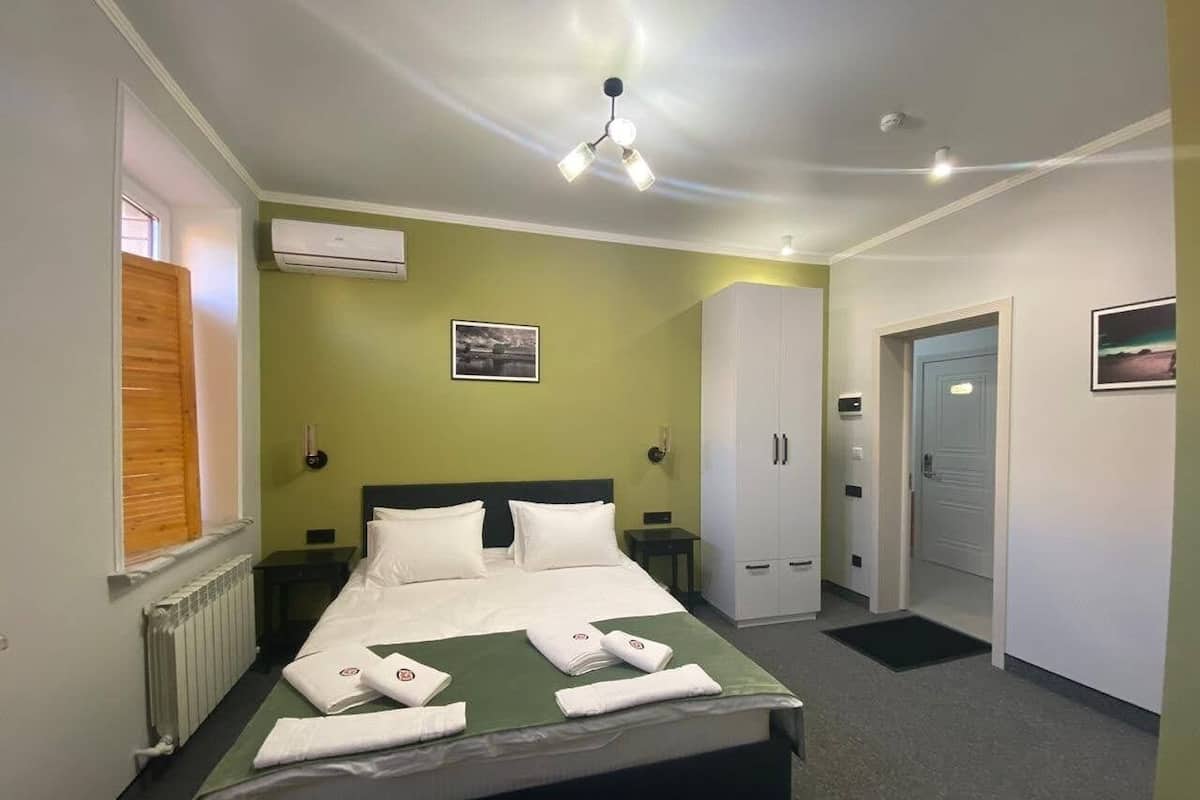 Premium bedding, down duvets, pillow-top beds, individually decorated
