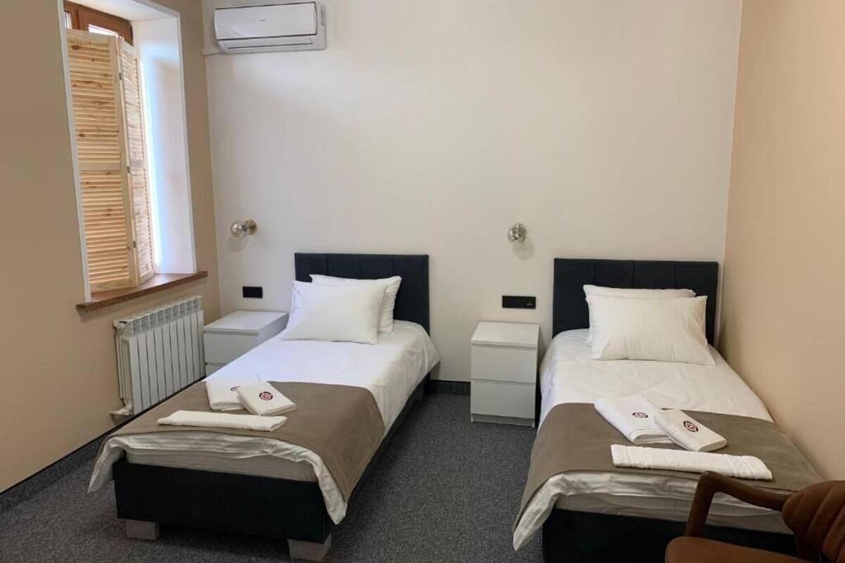 Premium bedding, down duvets, pillow-top beds, individually decorated