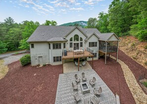 Back of home.  New patio with outdoor FP.  Bring your own wood/starters