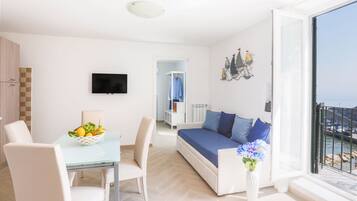 Family Apartment | Living area | Flat-screen TV