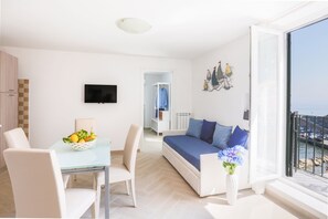 Familienapartment | Wohnbereich | Flachbildfernseher