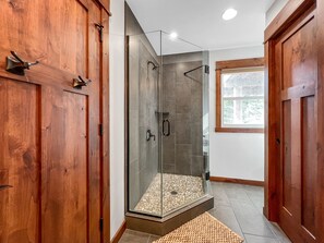 Combined shower/tub, hair dryer, towels, toilet paper