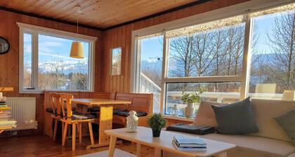Cottage w/ heated Aurora Igloo, Hot tub, & private covered patio.