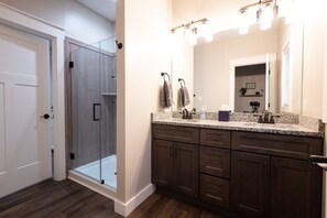 Combined shower/tub, hair dryer, towels, soap