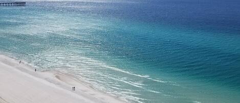 On the beach, sun loungers, beach towels