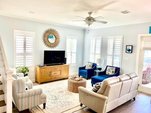 Smart TV, fireplace, books