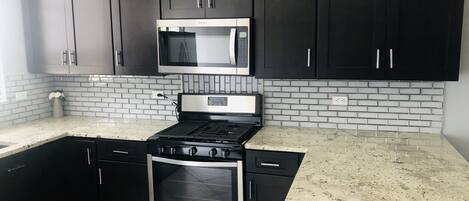 Fridge, microwave, coffee/tea maker, toaster