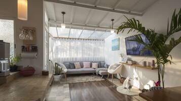 Superior Studio, Terrace, Garden View | Living area | 45-inch Smart TV with digital channels, Netflix, streaming services