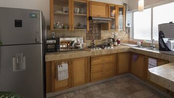 Superior Studio, Terrace, Garden View | Private kitchen | Mini-fridge, microwave, oven, blender