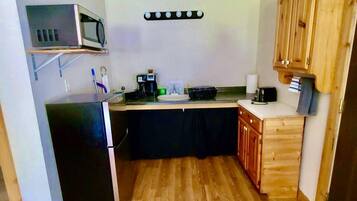 Fridge, microwave, coffee/tea maker, toaster