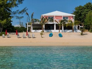 On the beach, sun-loungers, beach towels
