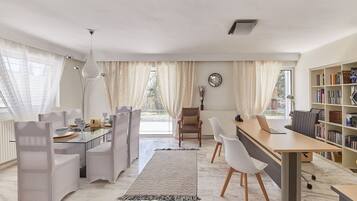 Villa | Living room | 30-inch TV with digital channels, fireplace