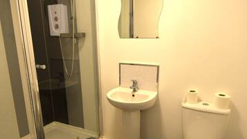 Shower, free toiletries, towels, soap