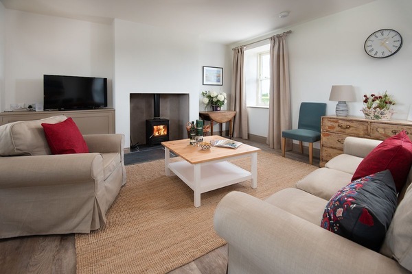 Lookout South - open-plan living area with large sofa