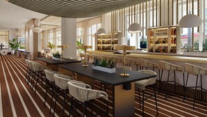 A modern bar area with striped flooring, bar stools, and a central bar counter. - Singer Island Palm Beach Marriott: 2 BDRM/2 BATH Condo +Resort Access 14th Floor (Riviera Beach)
