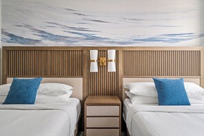 2 chambres, coffres-forts dans les chambres, fer et planche à repasser