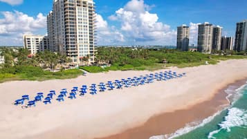 On the beach, sun loungers, beach towels