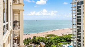 A high-rise hotel with balconies overlooking a beach. - Singer Island Palm Beach Marriott: 2 BDRM/2 BATH Condo +Resort Access 14th Floor (Riviera Beach)