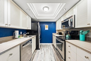 Condo, Multiple Beds, Sea View (Sunlight Sensation - C) | Private kitchen | Full-size fridge, microwave, oven, stovetop