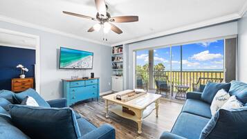 Condo, Multiple Beds, Sea View (Sunlight Sensation - C) | Living area | 32-inch TV with cable channels