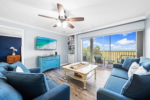 Condo, Multiple Beds, Sea View (Sunlight Sensation - C) | Living area | 32-inch TV with cable channels