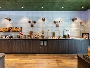 Daily buffet breakfast (EUR 18 per person)