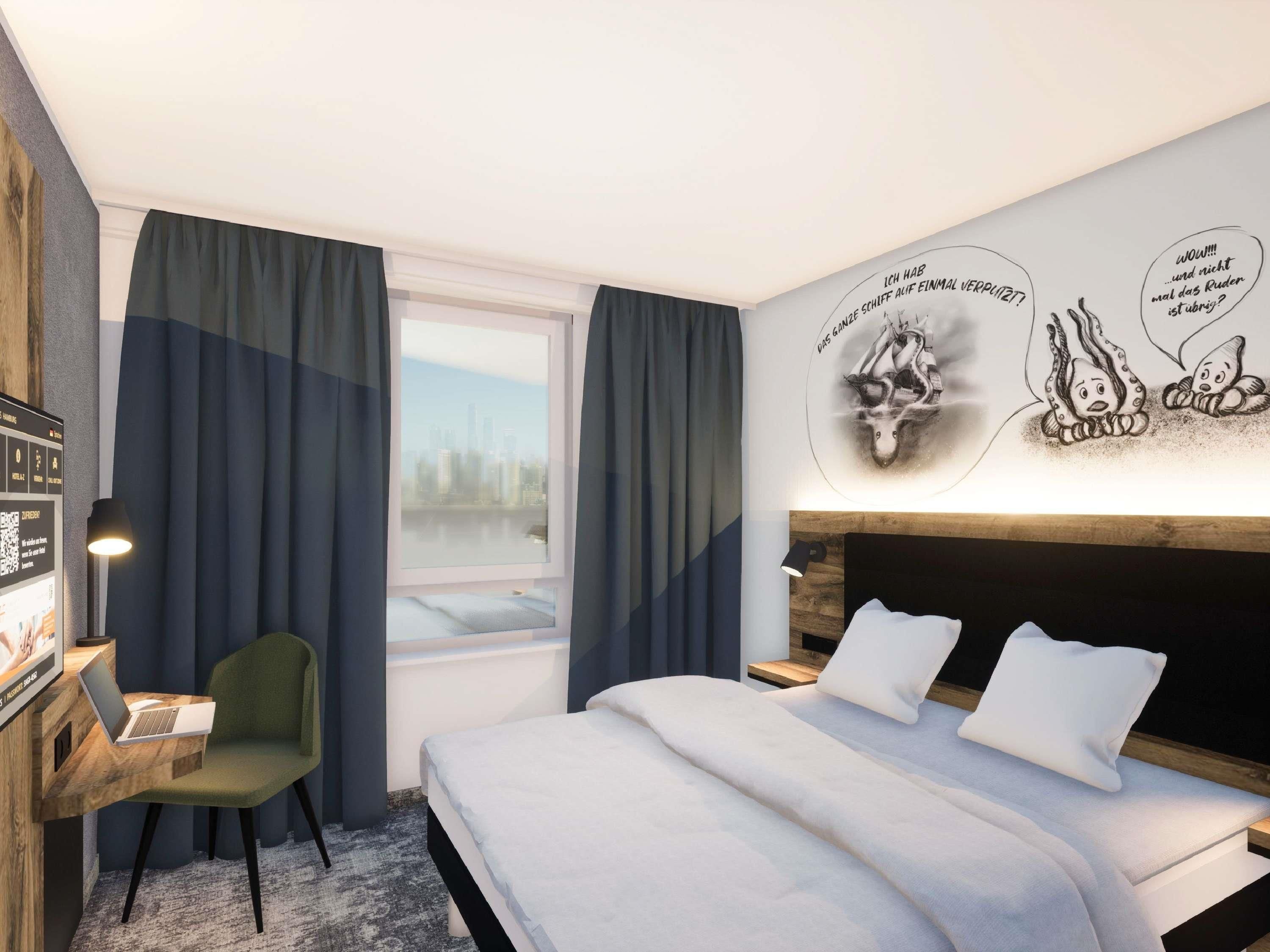 Habitación de hotel con cama, escritorio con computadora portátil, silla, ventana con cortinas y mural de paisaje urbano en la pared.