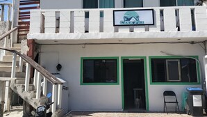 A two-story building with a sign reading "Casa Paz". - Vacation home (Isla Mujeres)