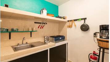 Fridge, microwave, stovetop, coffee/tea maker