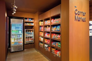 A grocery store with shelves stocked with various products, a refrigerated section, and a sign reading 'The Corner Market'. - Fairfield Inn Suites By Marriott Paramus (Paramus)
