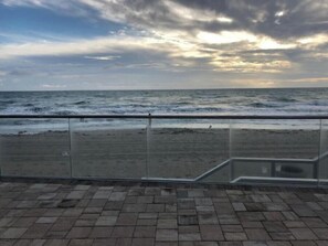 On the beach, sun loungers, beach towels