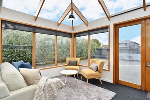 Chambre simple | Aire de séjour