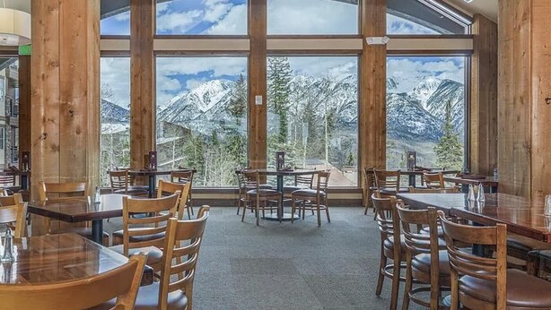 A restaurant with wooden interior and large windows offering a mountain view. - ⭐️New Listing ⭐️ At Purg Base ⎮Free WIFI + Fireplace (Durango)